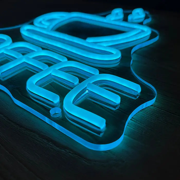 Coffee Tasse Neon LED Schild schräg von oben, Buchstaben und Tasse plastisch auf klarem Acryl