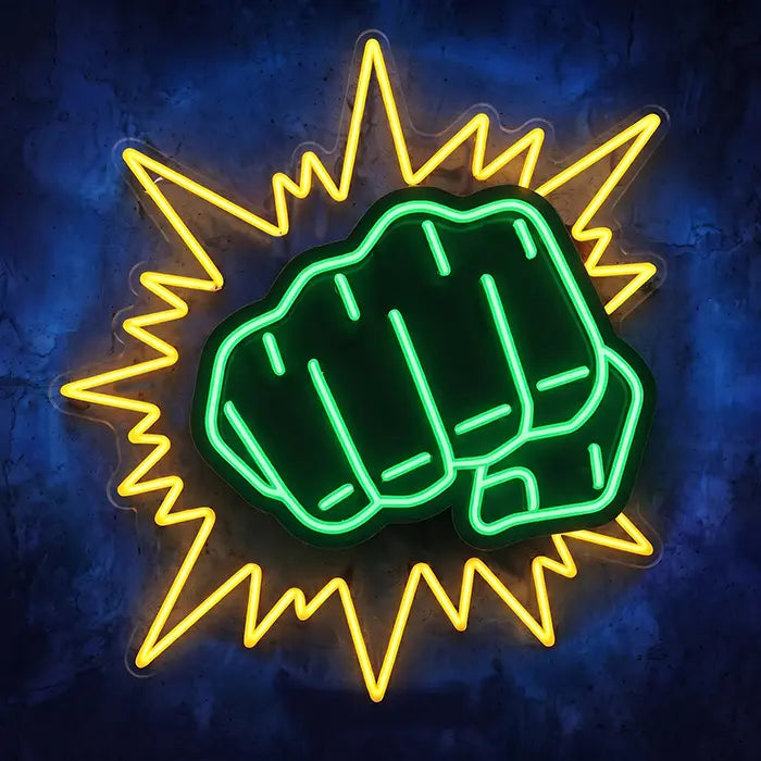 Hulk Faust Neon LED Schild in Grün und Gelb, geballte Faust in Comic-Explosion vor dunkelblauer Wand