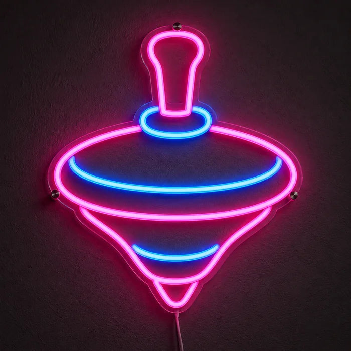 Spielkreisel Neon LED Schild leuchtend an einer dunklen Wand, Nahaufnahme mit Anschlusskabel