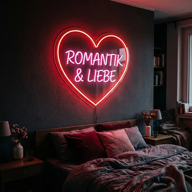 Neon LED Schild Romantik & Liebe – leuchtendes Herz in Rot und Pink im romantischen Schlafzimmer
