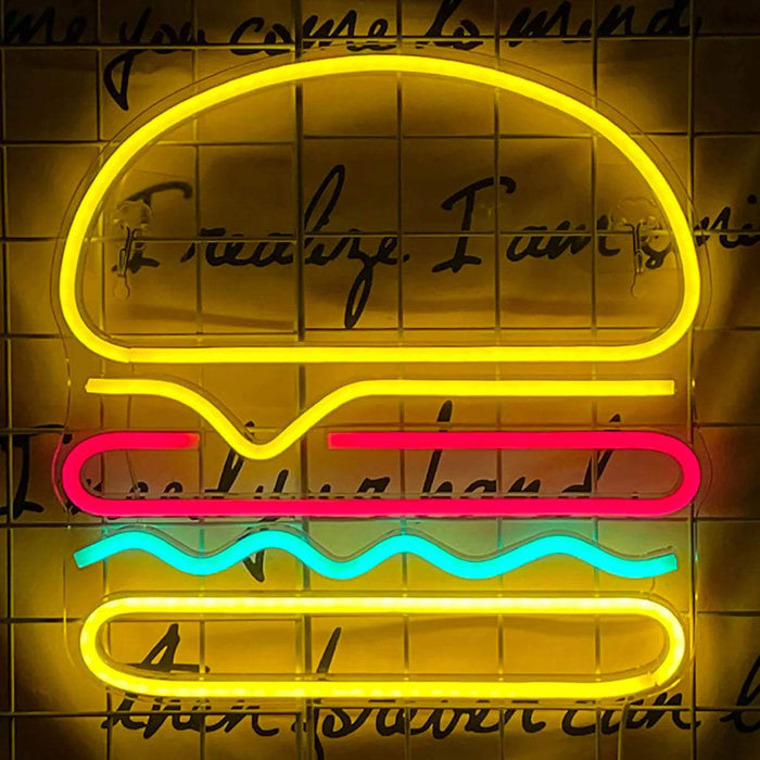 Cheeseburger Neon LED Schild an der Wand montiert, das Neon taucht die Fläche dahinter in warmes Licht