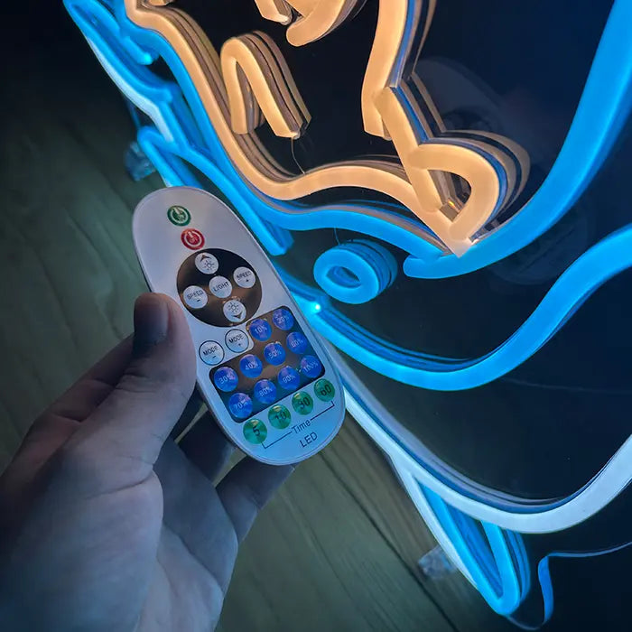 Pokémon Lapras Neon LED Schild aus der Nähe mit Fernbedienung in der Hand vor den Neonlinien