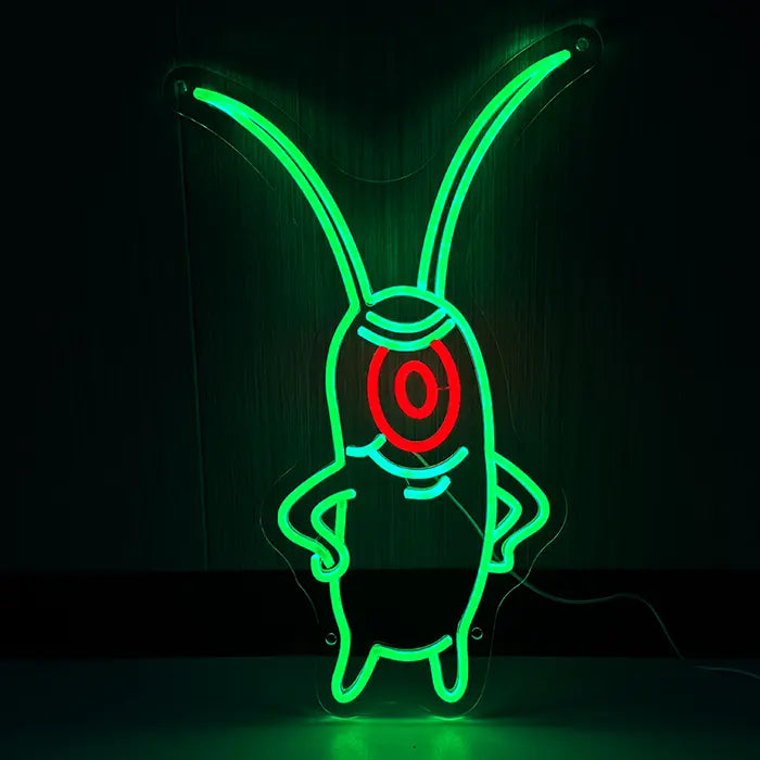 The Plankton Neon LED Schild frontal an dunkler Wand, grüner Plankton aus SpongeBob mit rotem Einauge