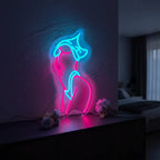 Dekoratives Neon-Licht mit einer sinnlichen Silhouette in Pink für eine künstlerische Ästhetik.
