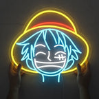 Detailreiches Luffy-Neon-Motiv in Blau, Gelb und Rot, das den Kopf des Strohhutpiraten darstellt.
