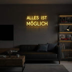 Gelber Neon-Schriftzug mit dem deutschen Zitat "Alles ist möglich", ideal zur Steigerung der Motivation in Arbeitsbereichen.