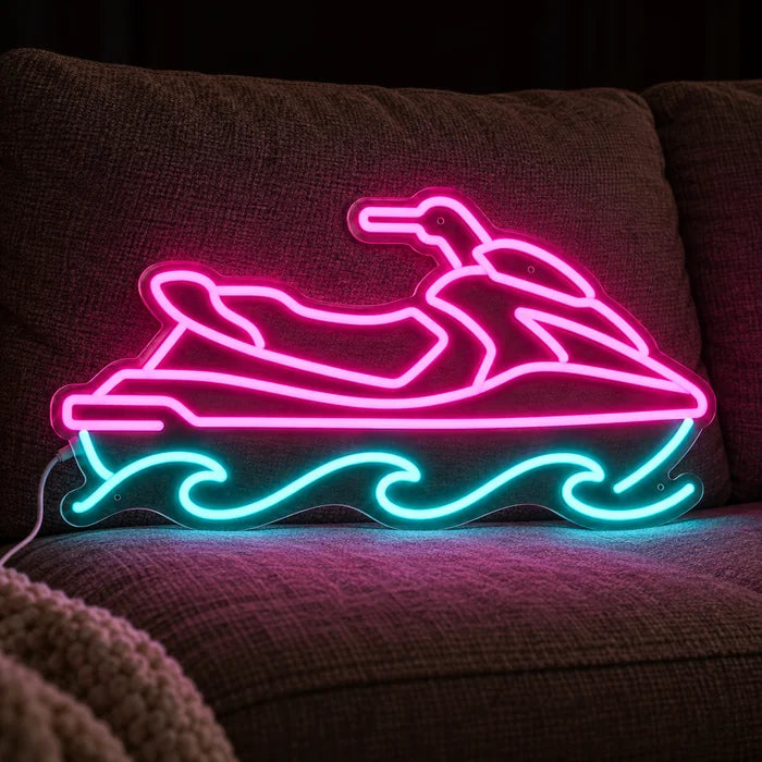 Jetski Neon LED Schild auf einem gemütlichen Sofa zwischen Kissen und Decke