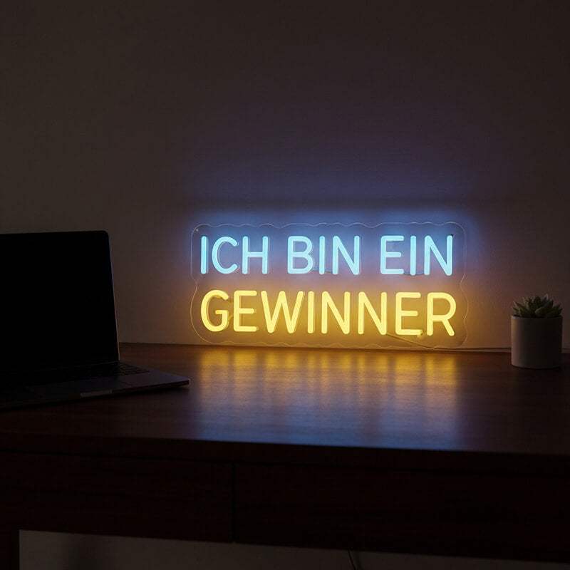 Custom-made Neon-Schild mit dem Gewinner-Motto, ideal als Geschenk für Unternehmer oder zur Stärkung des Selbstvertrauens.