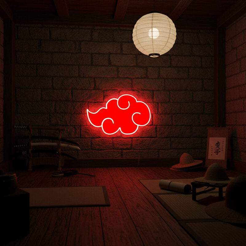 Ästhetisches Neon-Wandlicht in der Form einer roten Manga-Wolke, das sich auf der Oberfläche darunter spiegelt.
