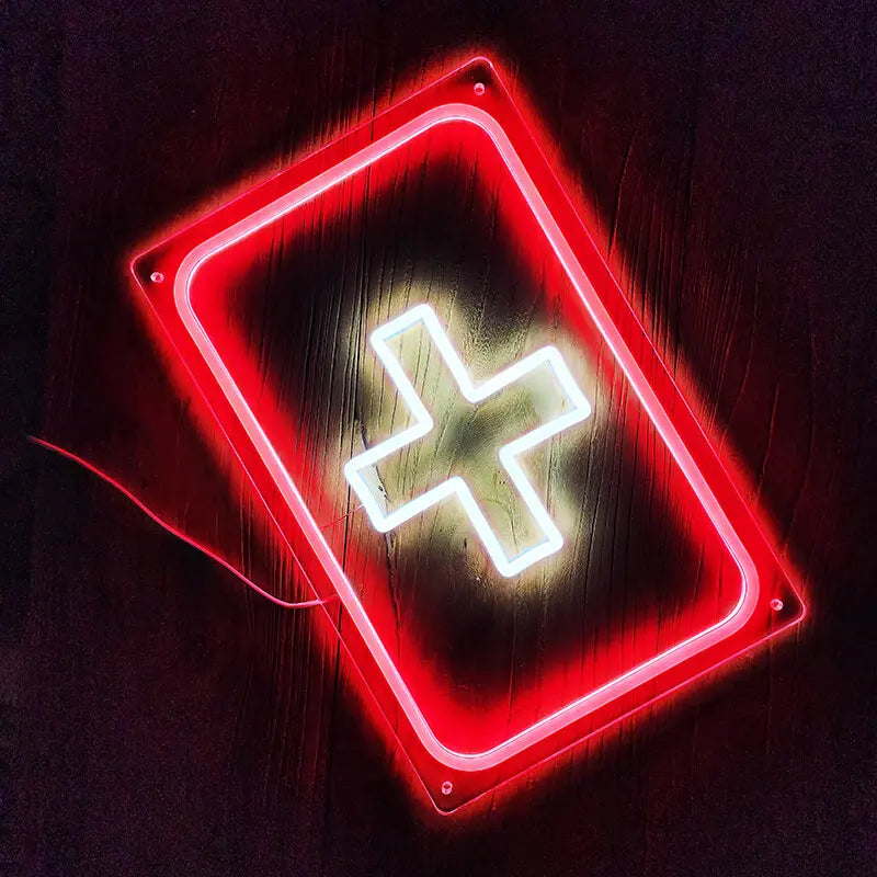 Helles, flexibles LED-Kreuz in Weiß, umgeben von einem roten Neon-Rand als auffälliges Dekor-Element.
