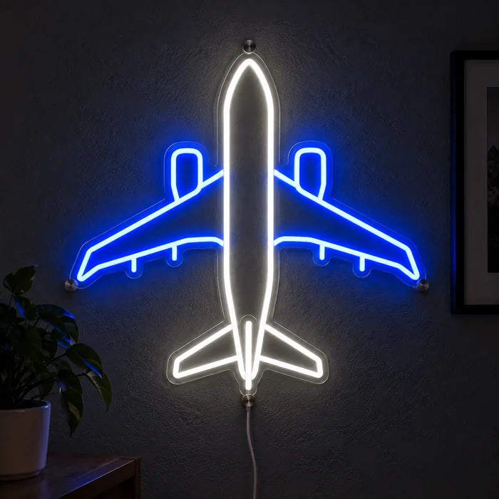 Passagierflugzeug Neon LED Schild leuchtend an einer dunklen Wand, Nahaufnahme mit Anschlusskabel
