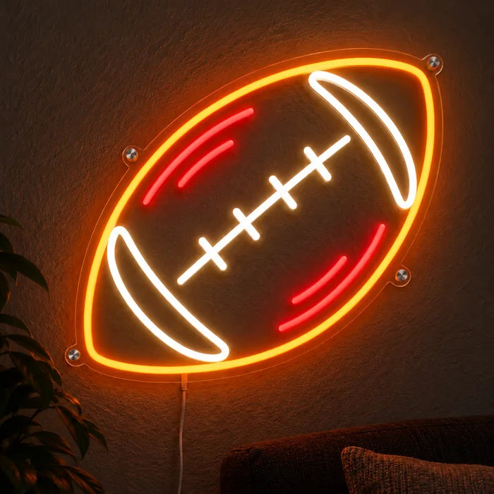 Rugbyball Neon LED Schild leuchtend an einer dunklen Wand, Nahaufnahme mit Anschlusskabel