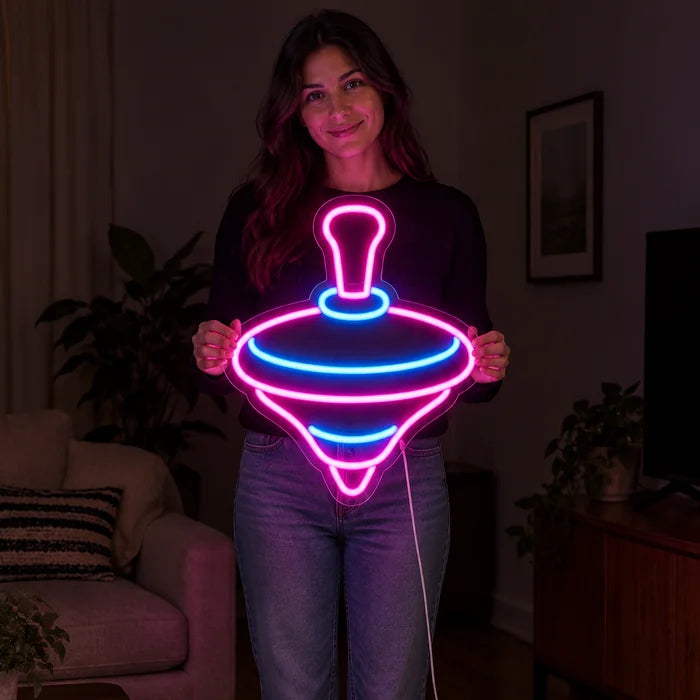 Spielkreisel Neon LED Schild von einer Frau gehalten, zeigt die Größe im Vergleich zum Körper