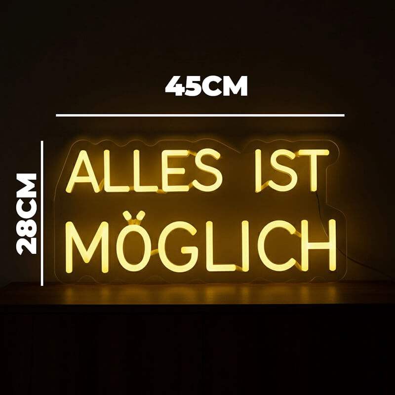 Warm leuchtendes Neon-Zeichen, das den Lebensspruch "ALLES IST MÖGLICH" in zwei Zeilen darstellt und eine Reflexion auf dem Boden erzeugt.