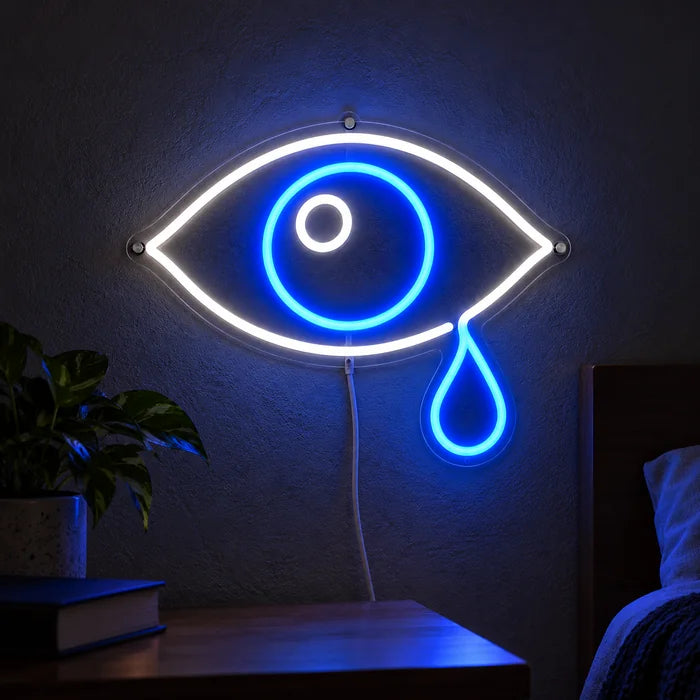 Tränenauge Neon LED Schild leuchtend an einer dunklen Wand, Nahaufnahme mit Anschlusskabel
