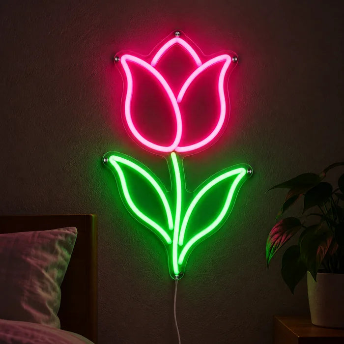 Tulpe Neon LED Schild leuchtend an einer dunklen Wand, Nahaufnahme mit Anschlusskabel